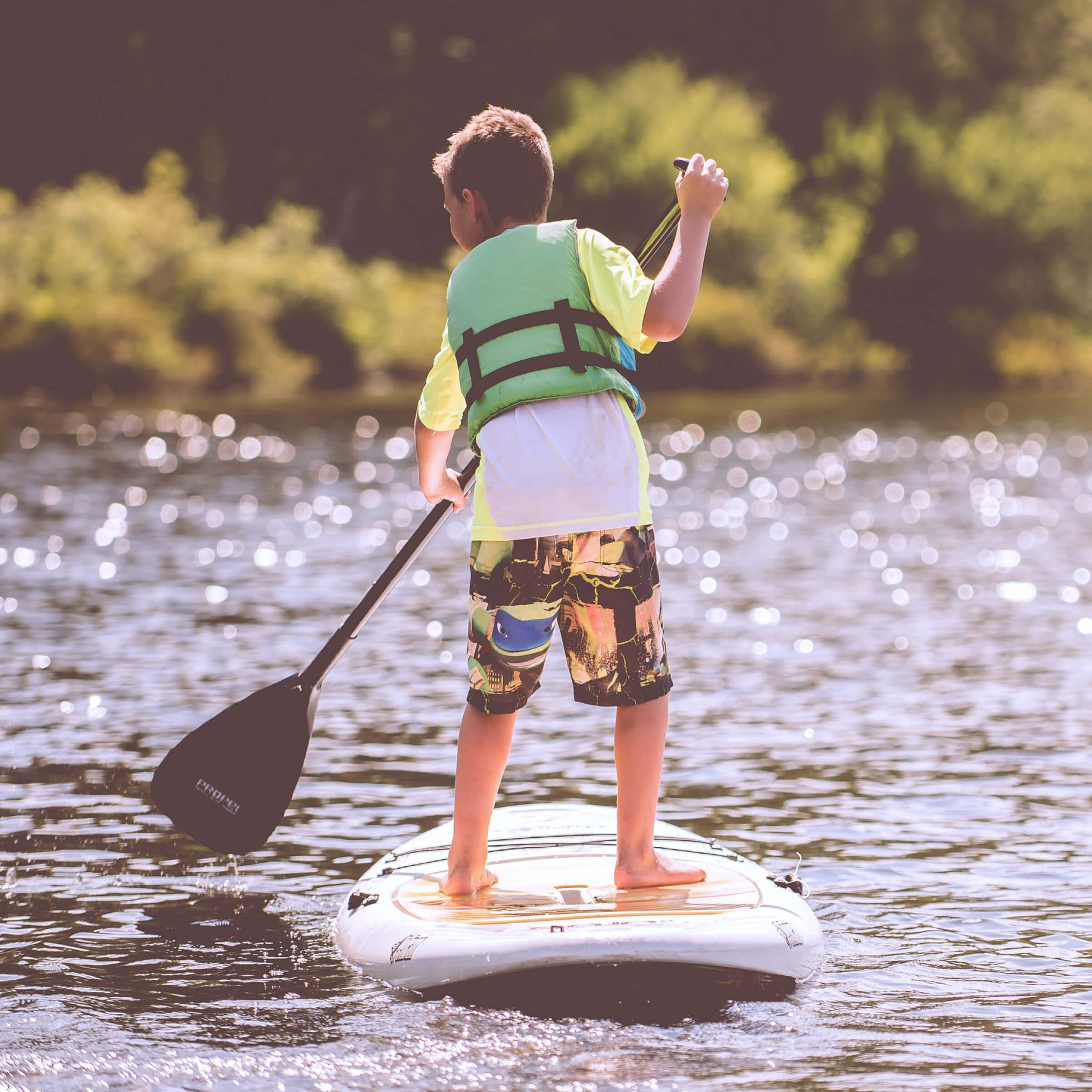 Child paddleboarding