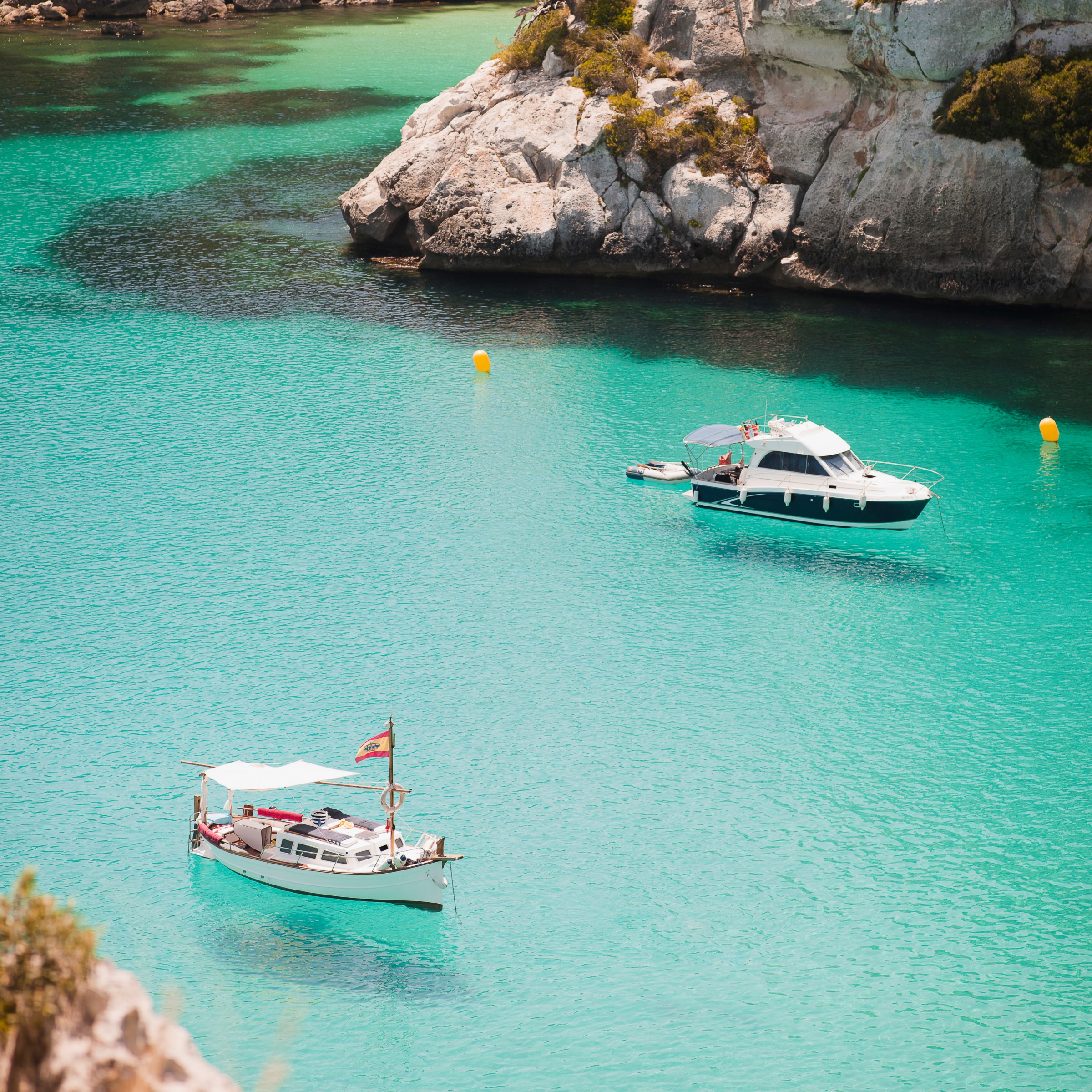 Boats in turquoise Mediterranean water